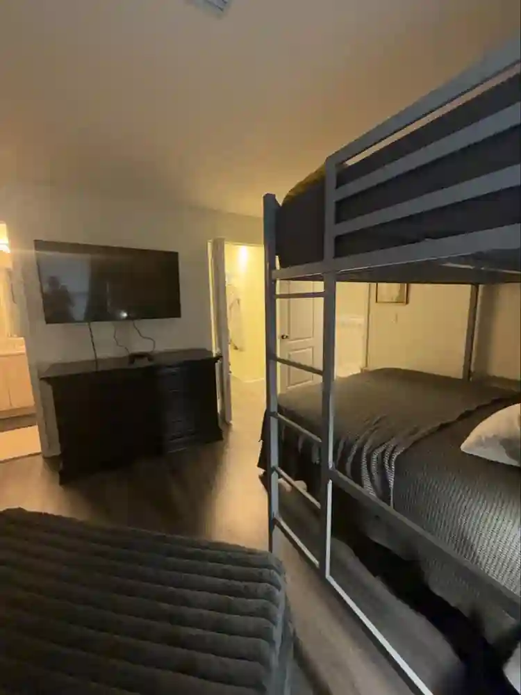Furnished bedroom with bathroom