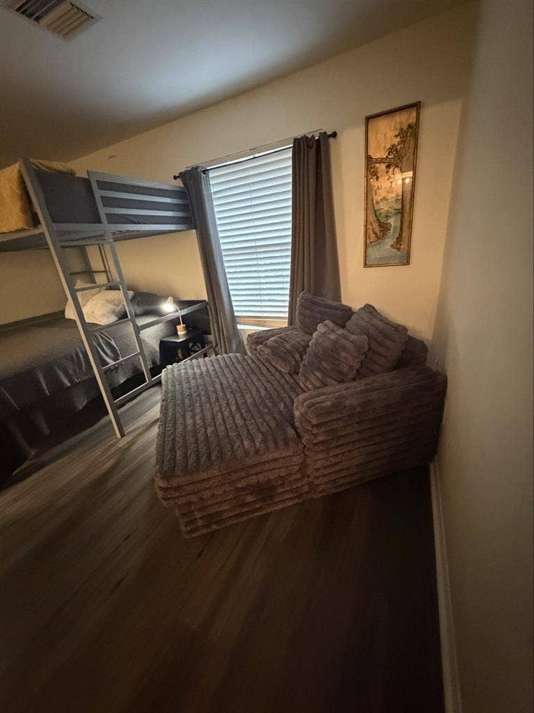 Furnished bedroom with bathroom