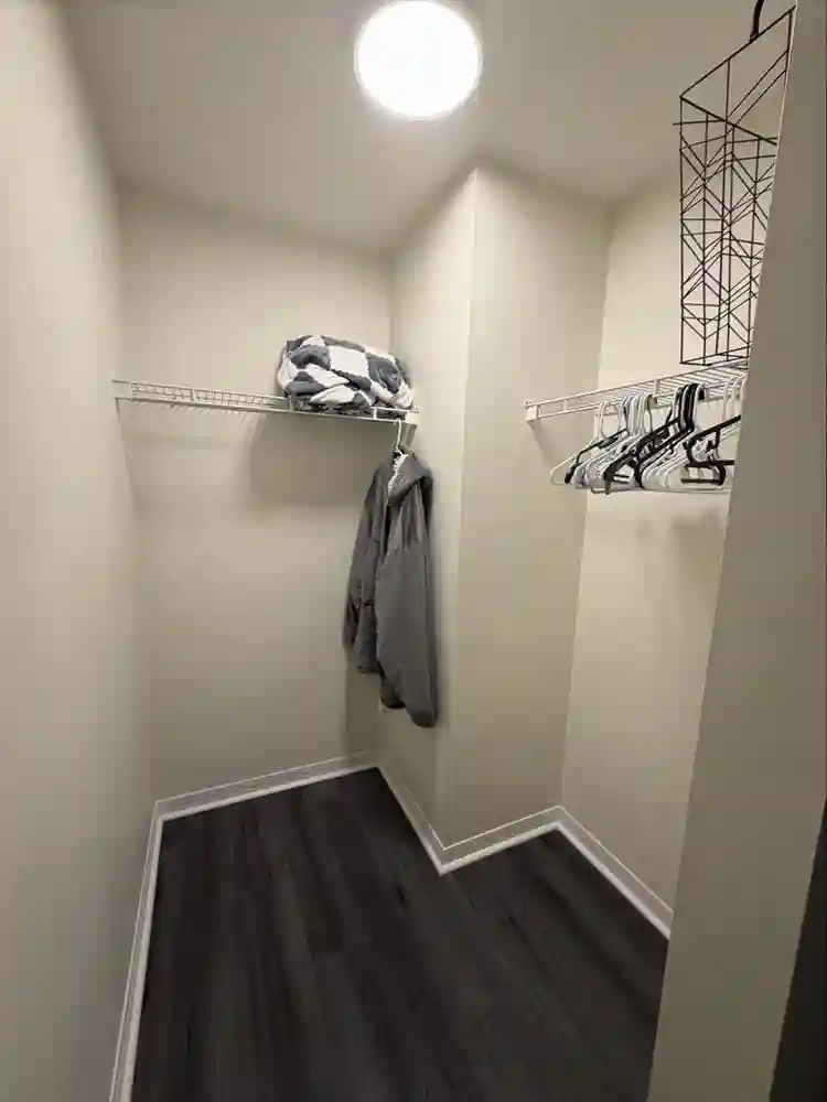 Furnished bedroom with bathroom