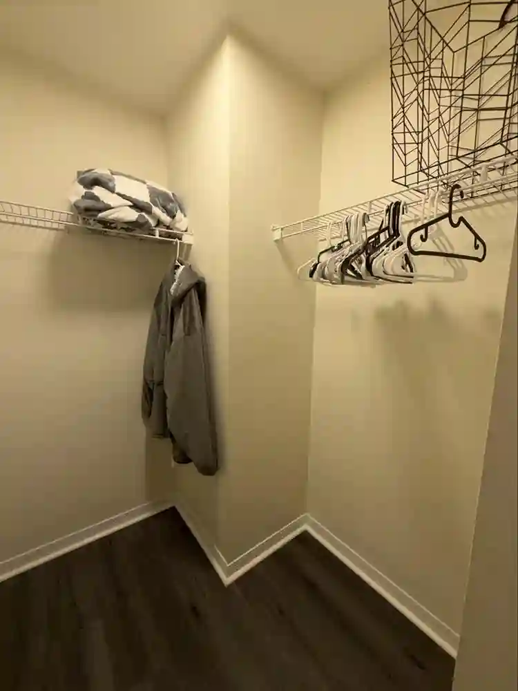 Furnished bedroom with bathroom