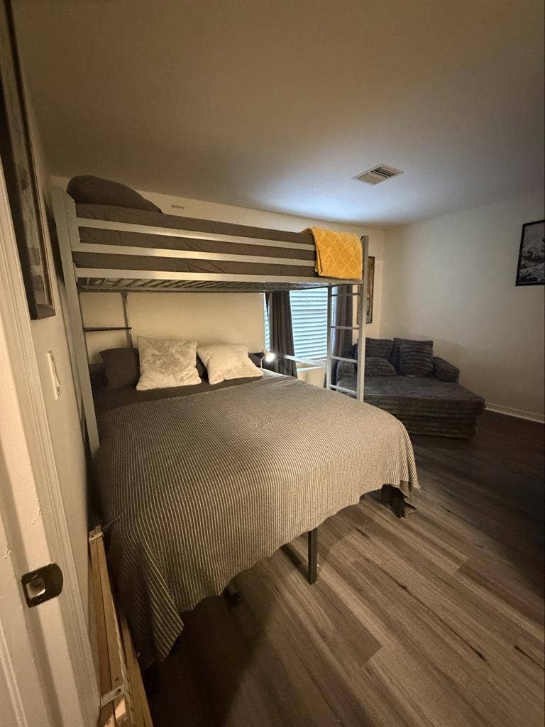 Furnished bedroom with bathroom