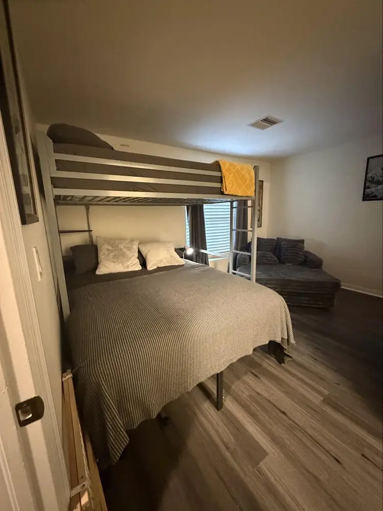 Furnished bedroom with bathroom