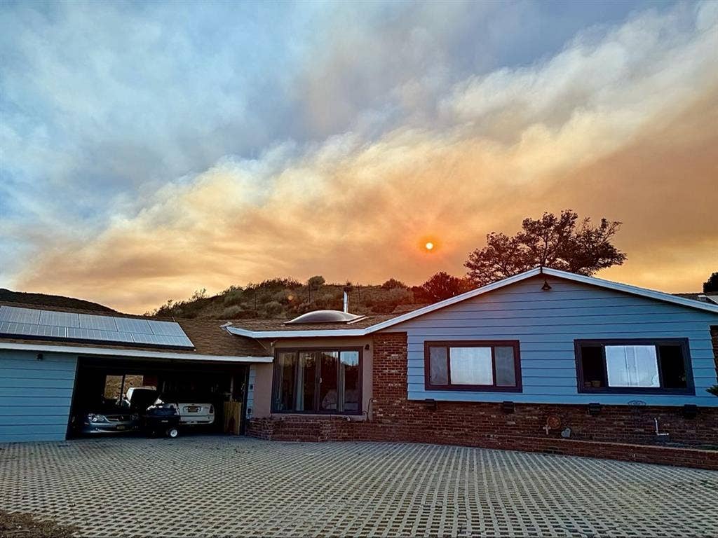 Commuter friendly hilltop view home