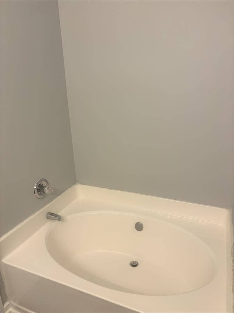 Master bed with private bathroom
