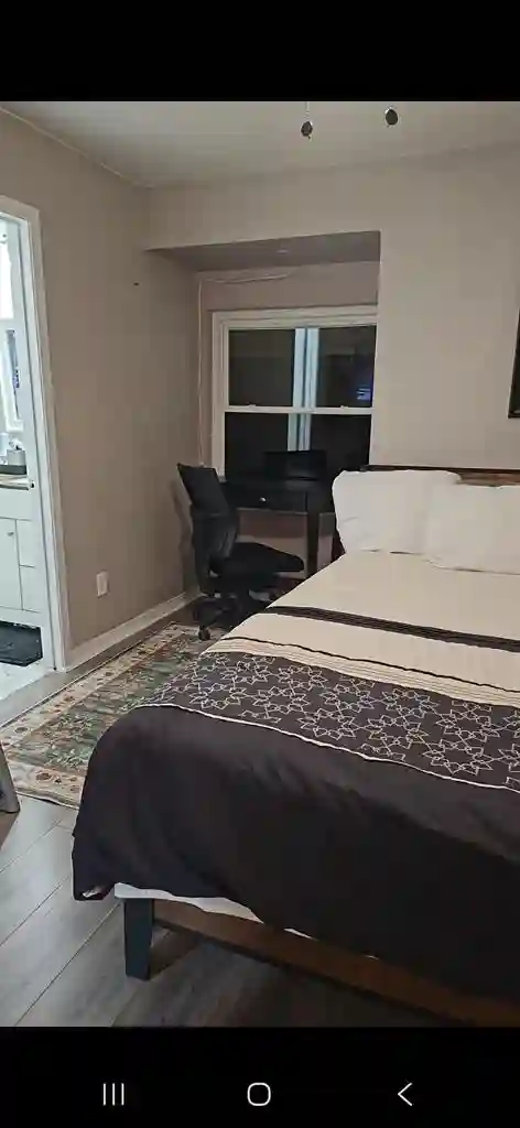 Upstairs bedroom with a share bathr