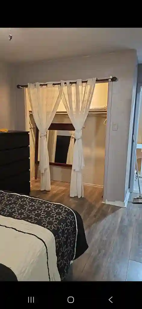 Upstairs bedroom with a share bathr