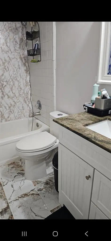 Upstairs bedroom with a share bathr