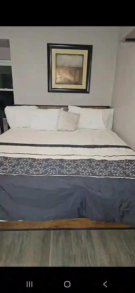 Upstairs bedroom with a share bathr