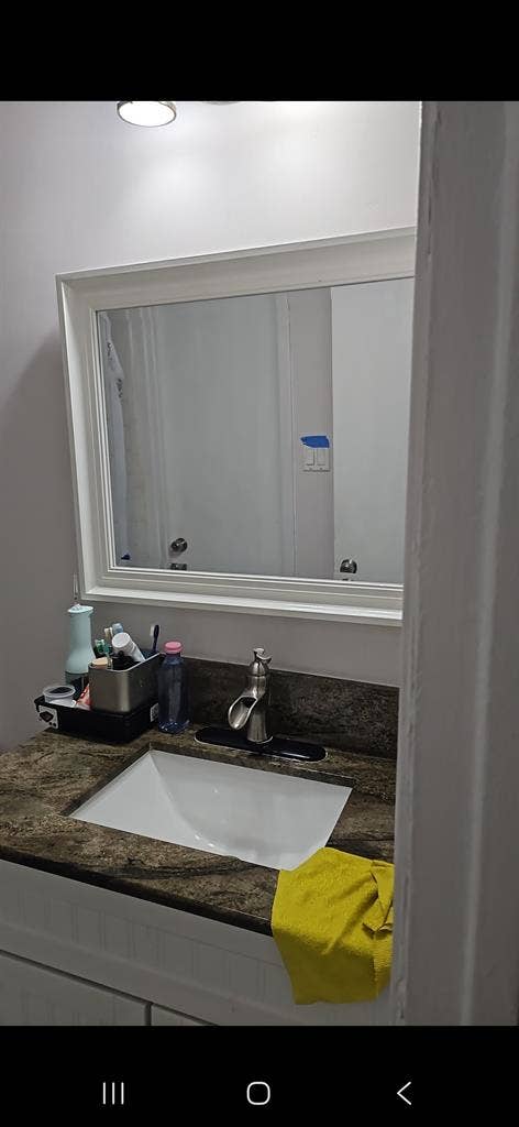 Upstairs bedroom with a share bathr