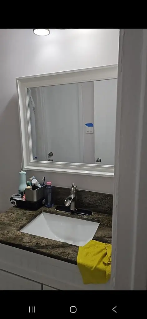 Upstairs bedroom with a share bathr