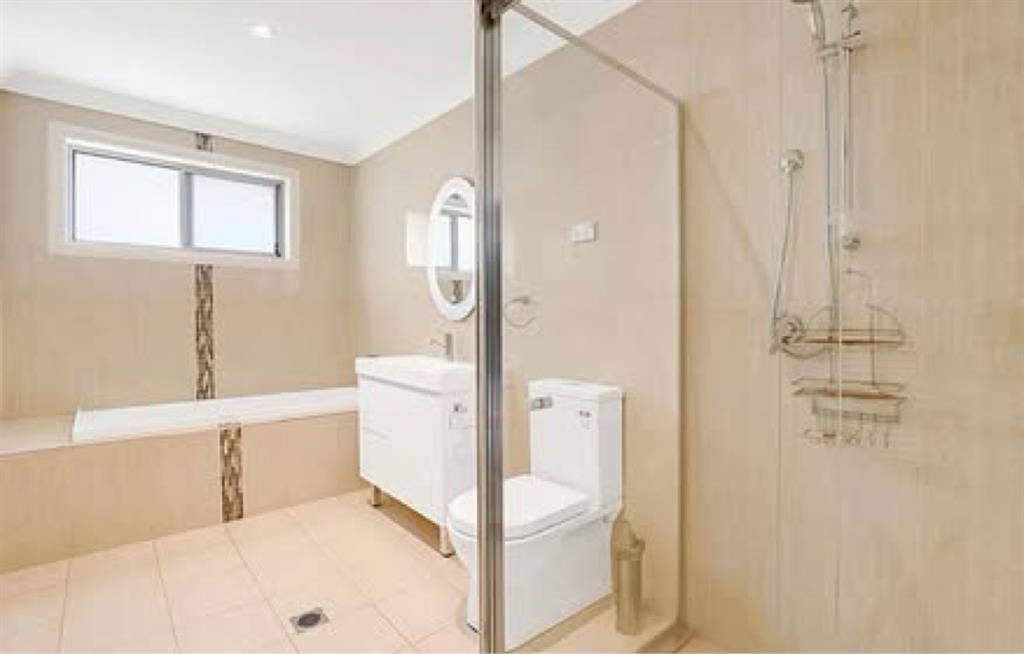 Two girls share one large bathroom