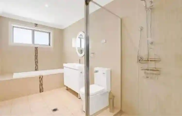 Two girls share one large bathroom