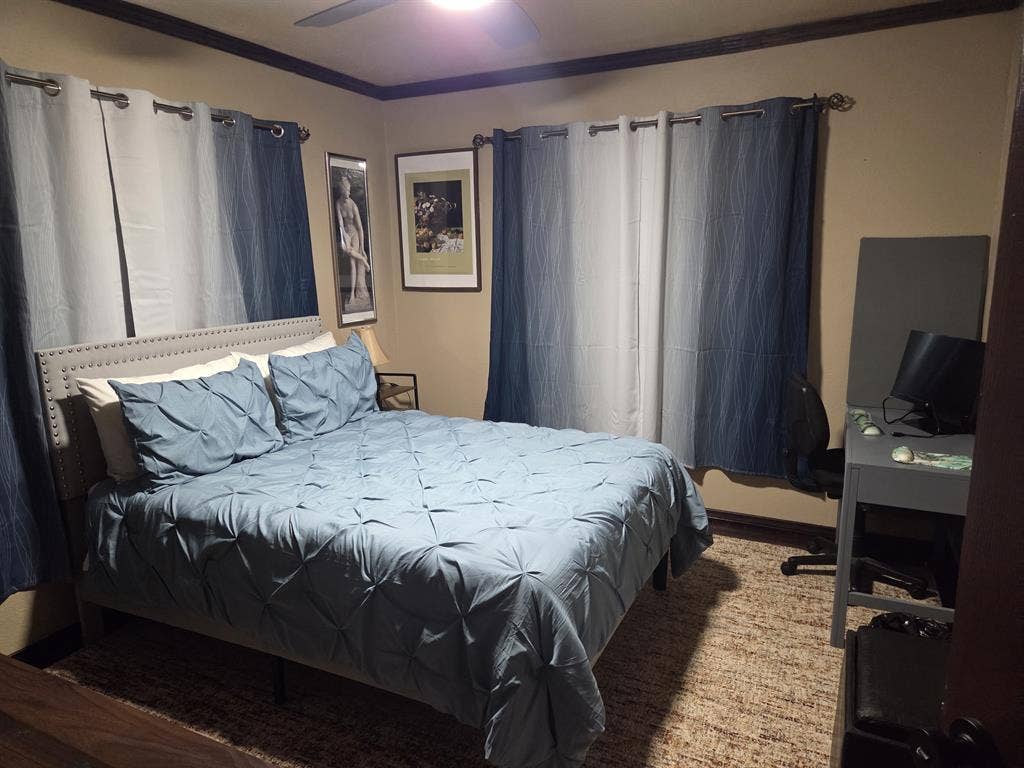 Furnished bedroom with private bath
