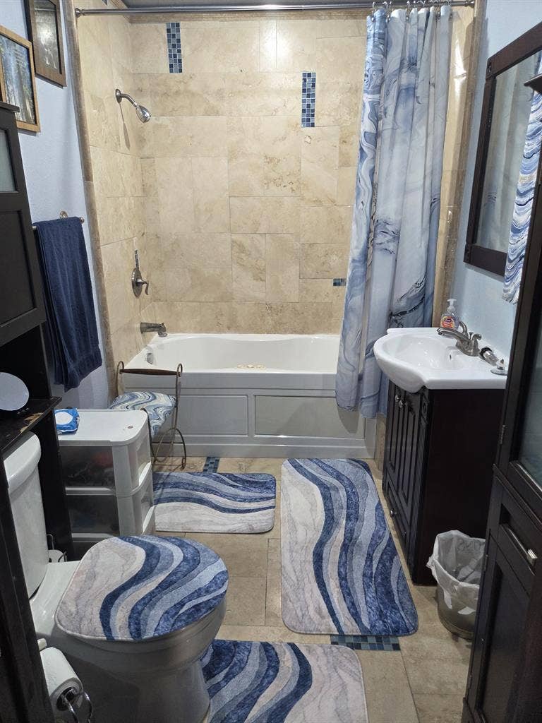 Furnished bedroom with private bath