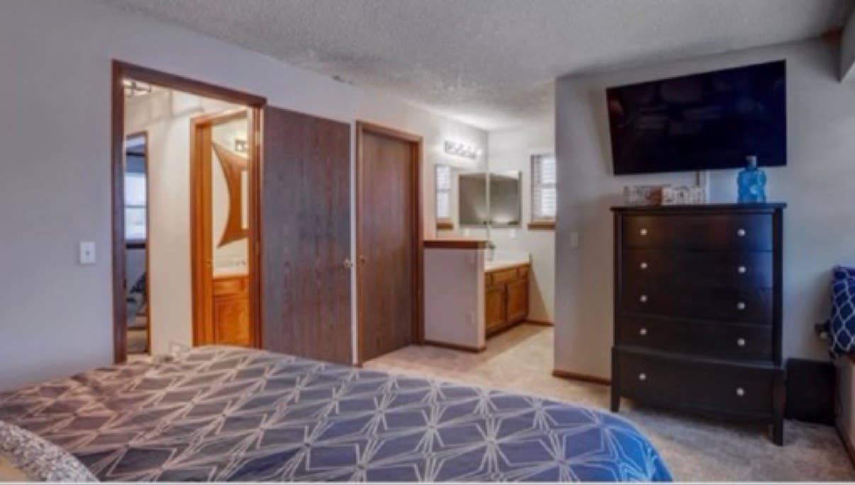 Master bedroom + shared bathroom