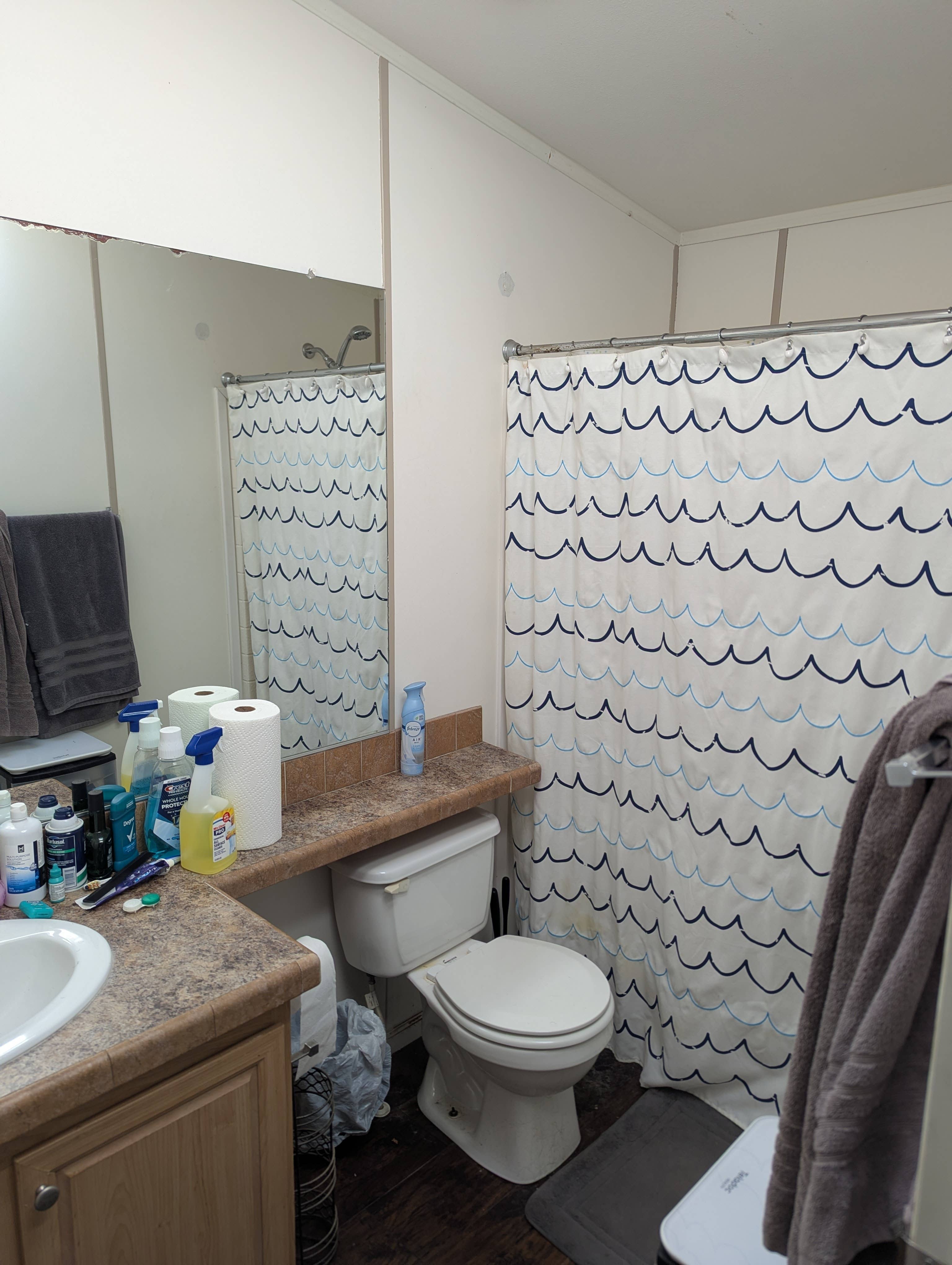 Bed and shared bath 12/01