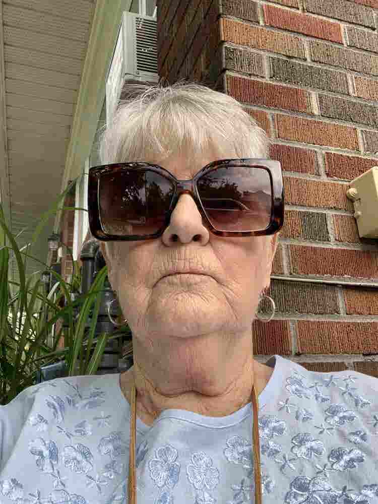 Senior with small  support dog