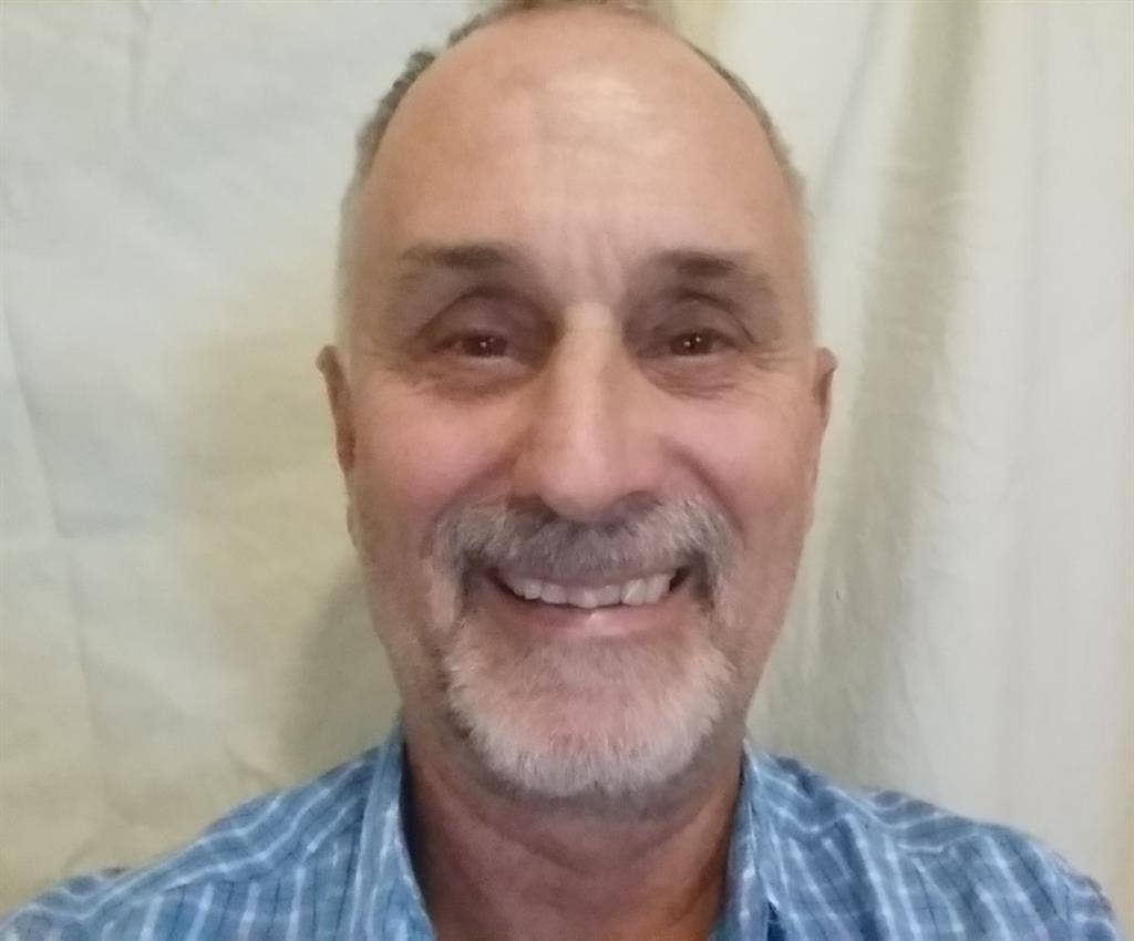 Friendly Considerate Man With Cat