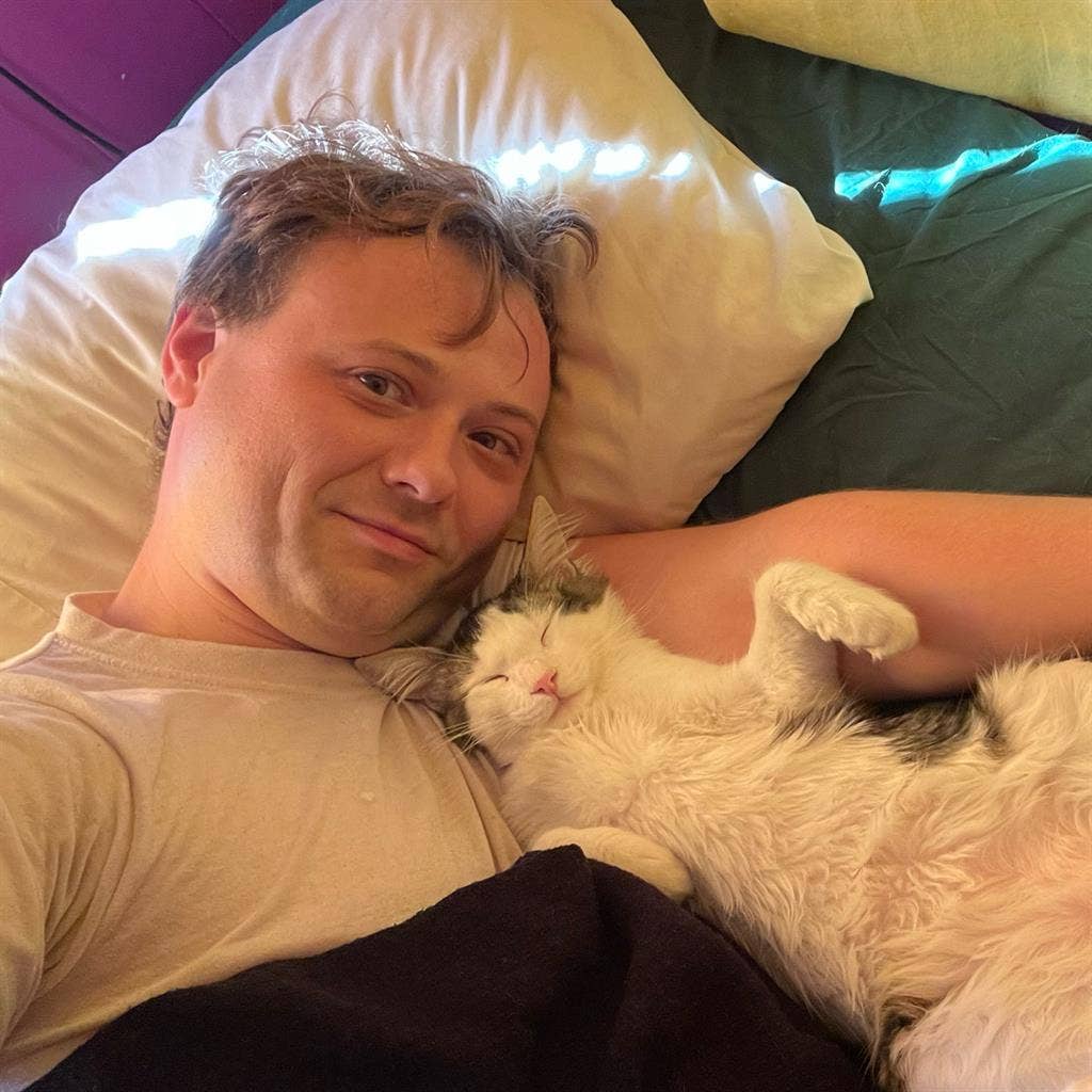 A gay and their cat