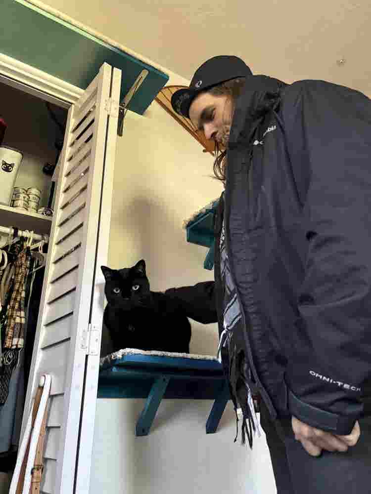 Couple with Cat Son Seeking Refuge