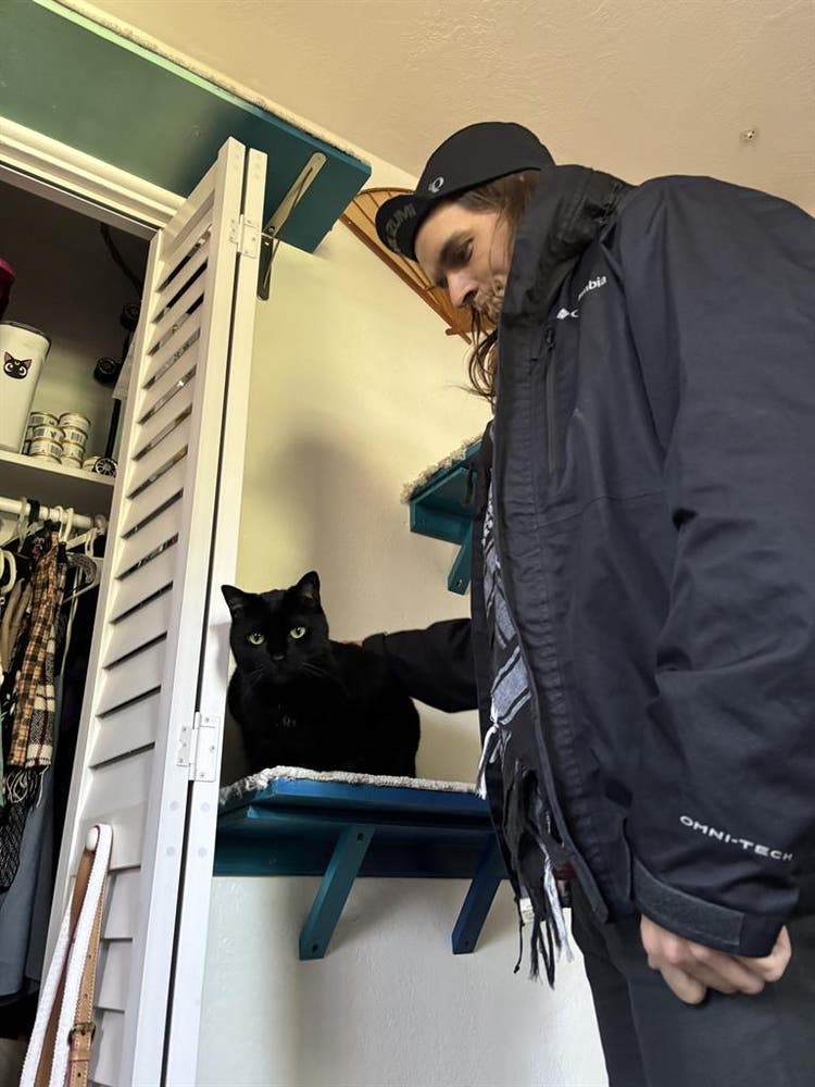 Couple with Cat Son Seeking Refuge
