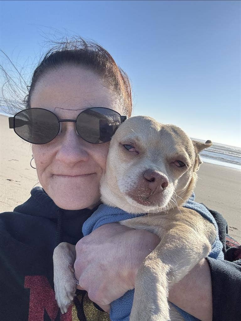 52 year old woman, & therapy dog