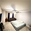 Master bedroom with deep closet.