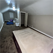 Huge carpeted attic room