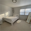 A bedroom fully furnished