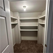 Basement room w/ walk in closet