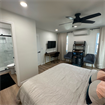 Room w/ensuite bath and balcony