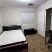 Room with all new bed and furniture